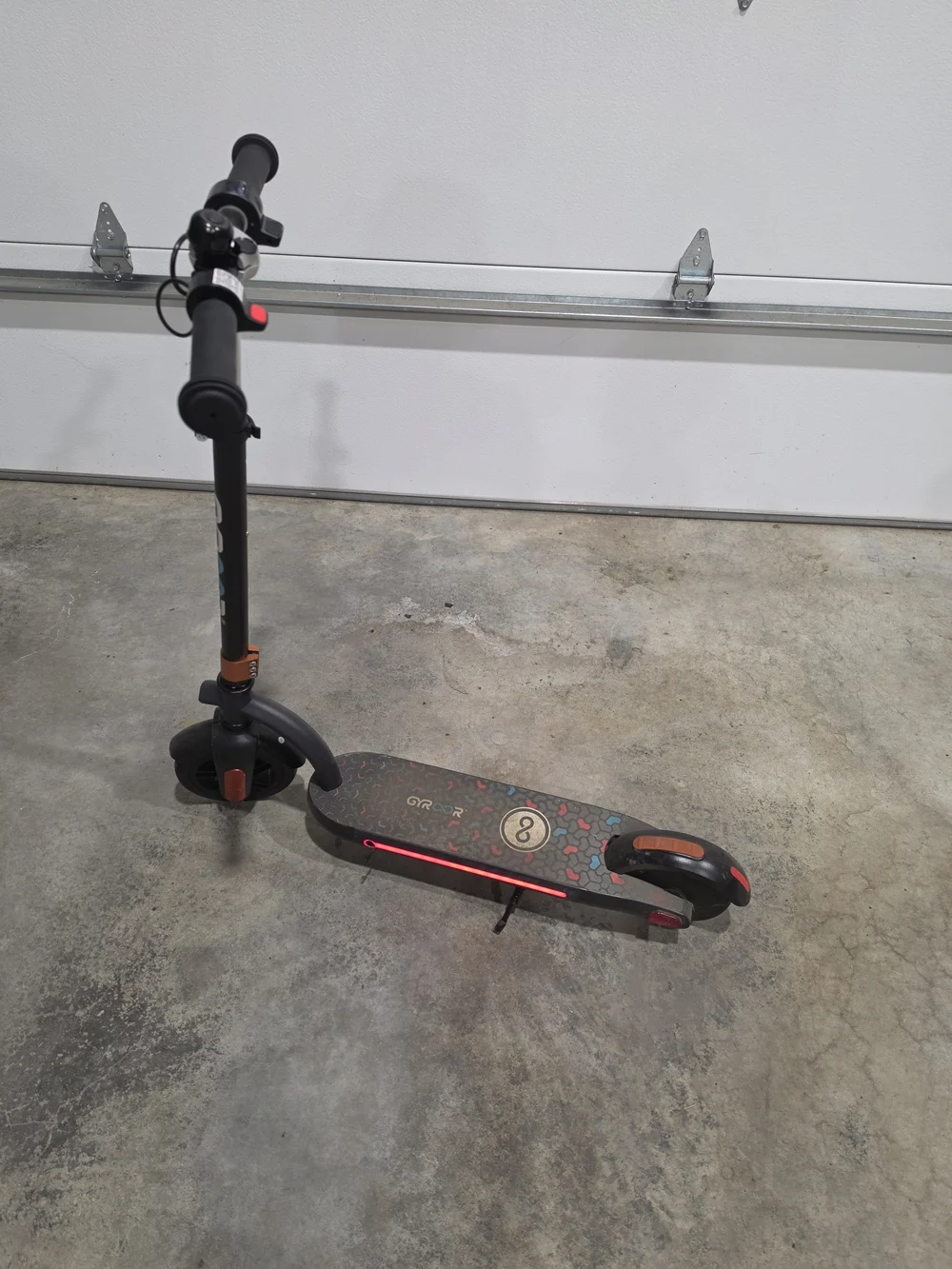 Kids Electric Scooter in Black and Orange - Lightweight Foldable Ride-On